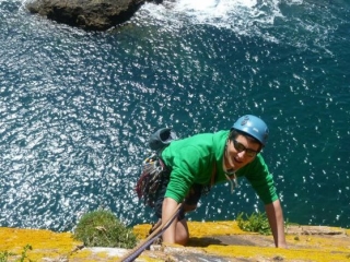 Boy climbing up a hill
